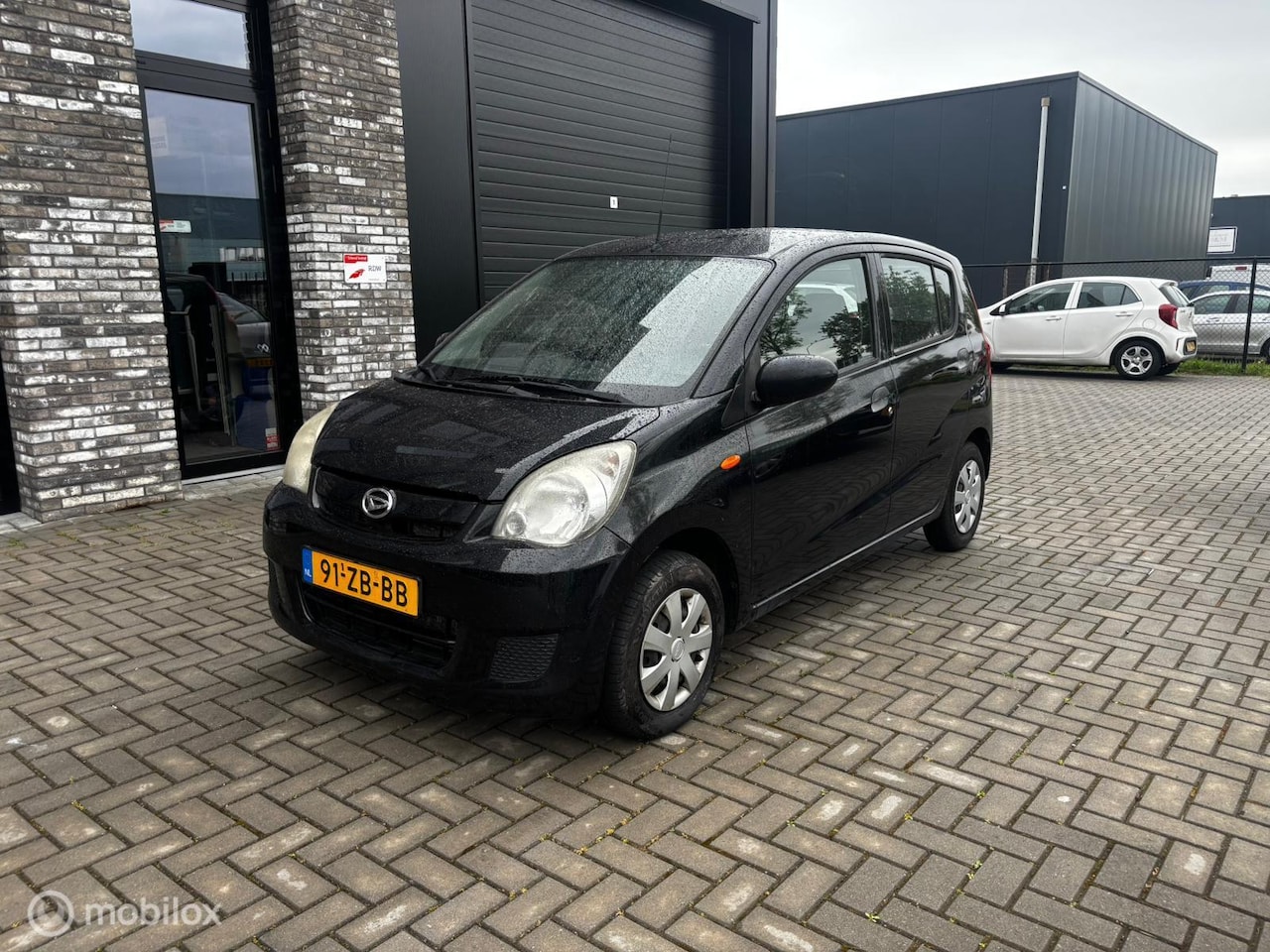 Daihatsu Cuore - 1.0 Premium 1.0 Premium Nieuwe APK - AutoWereld.nl