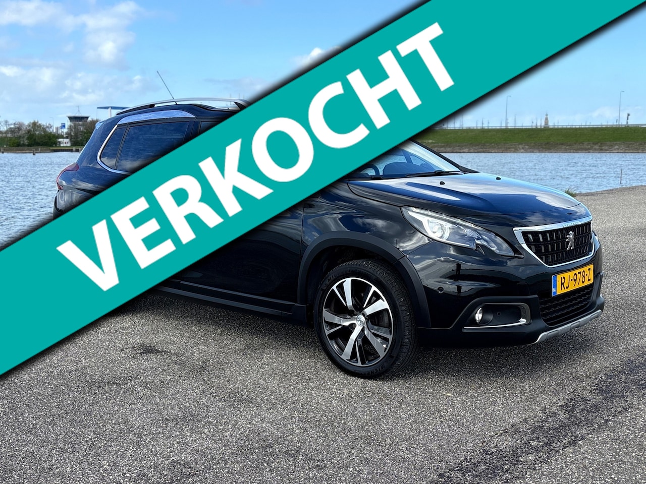 Peugeot 2008 - 1.2 PureTech Allure/Navi/ECC/Pano/Cam/Vol opties/Nap - AutoWereld.nl