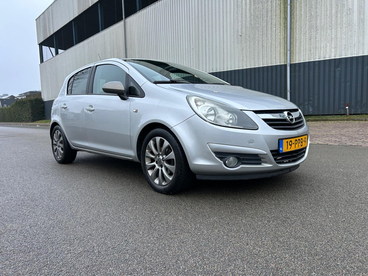 Opel Corsa - 1.4-16V '111' Edition Airco/Cruise/Aux - AutoWereld.nl