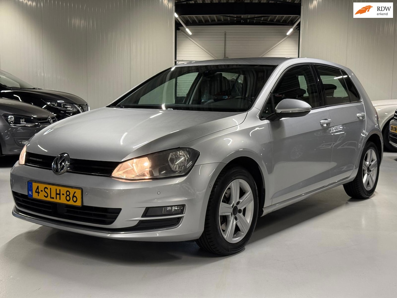 Volkswagen Golf - 1.4 TSI 122PK Highline Navigatie|Messagestoel. - AutoWereld.nl