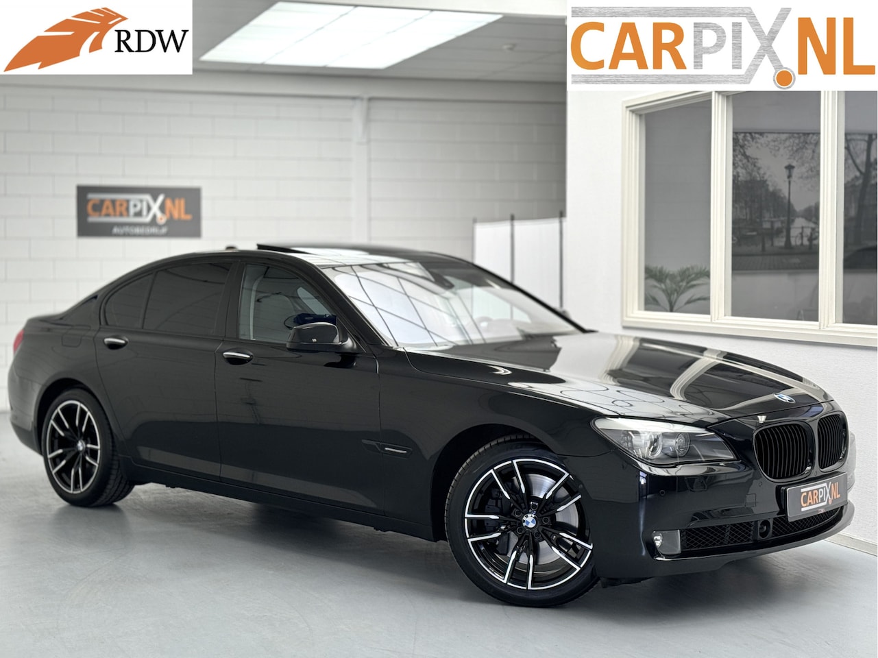 BMW 7-serie - 750i 750i, 408pk, Radar, 19", Lage km - AutoWereld.nl