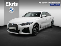 BMW i4 - eDrive40 M Sportpakket Pro | Stuurwielrand Verwarmd | Achteruitrijcamera | Schuifdak | DAB