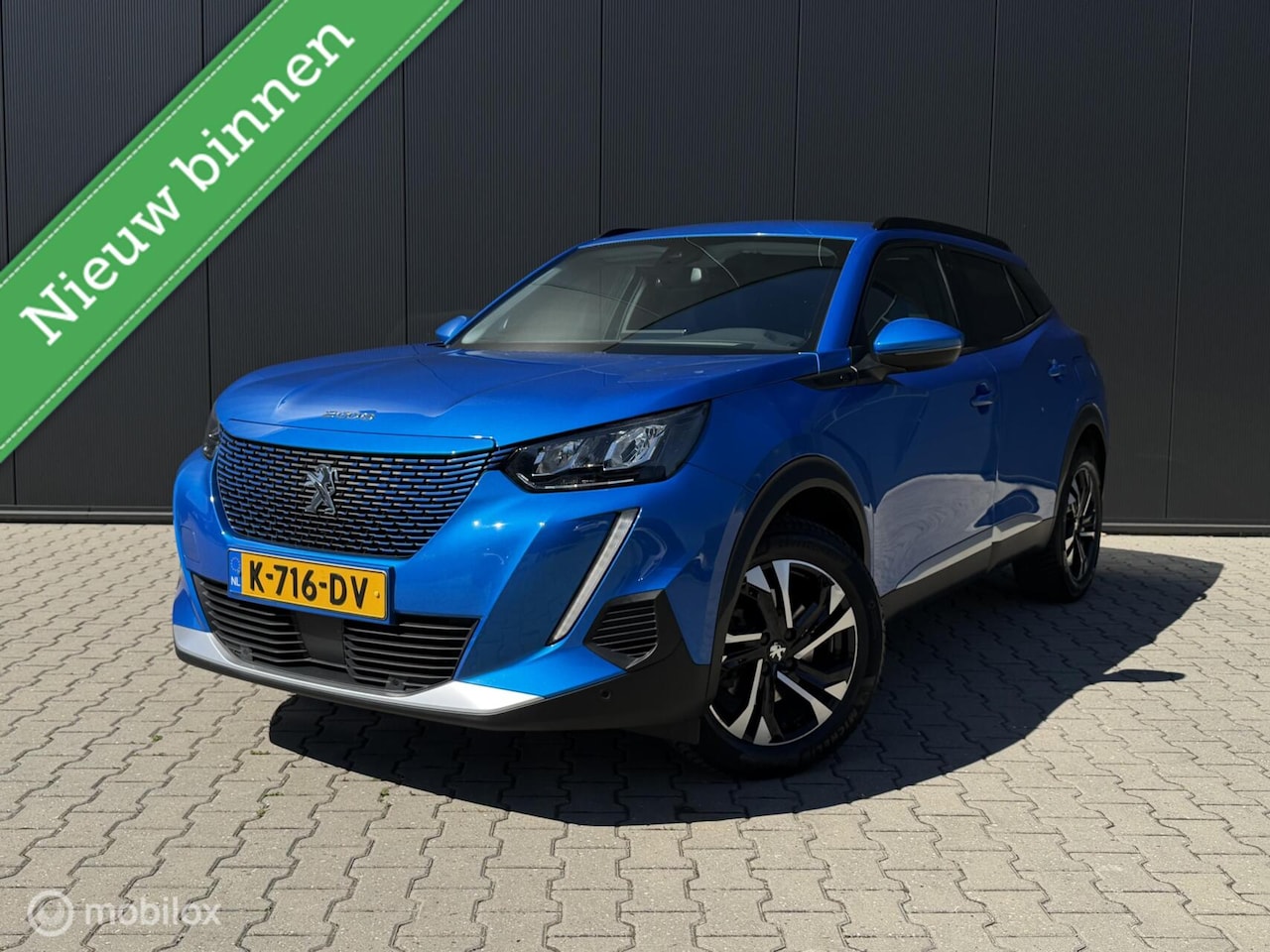 Peugeot e-2008 - EV Allure 50 kWh/360/Carplay/Led/Cruise/3D - AutoWereld.nl