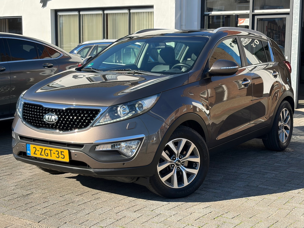 Kia Sportage - 1.6 GDI ExecutiveLine 1.6 GDI ExecutiveLine, Schuif/kanteldak, Stoelverwarming, Navigatie, Climate Control, Crui - AutoWereld.nl