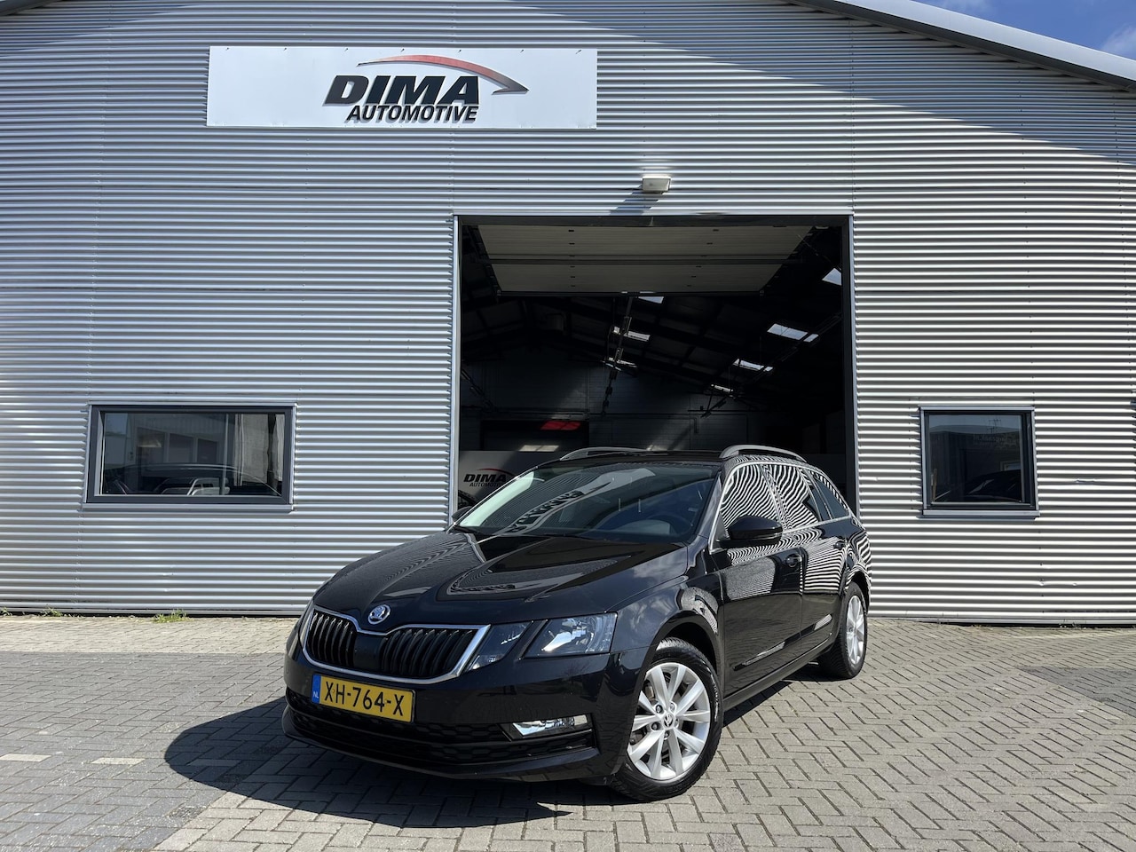 Skoda Octavia Combi - 1.0 TSI Greentech Ambition Business Trekhaak - AutoWereld.nl