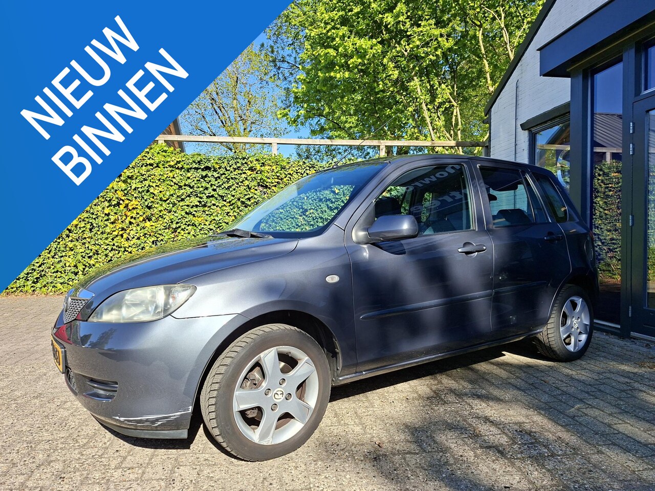 Mazda 2 - 1.4 Exclusive Airco, trekhaak - AutoWereld.nl