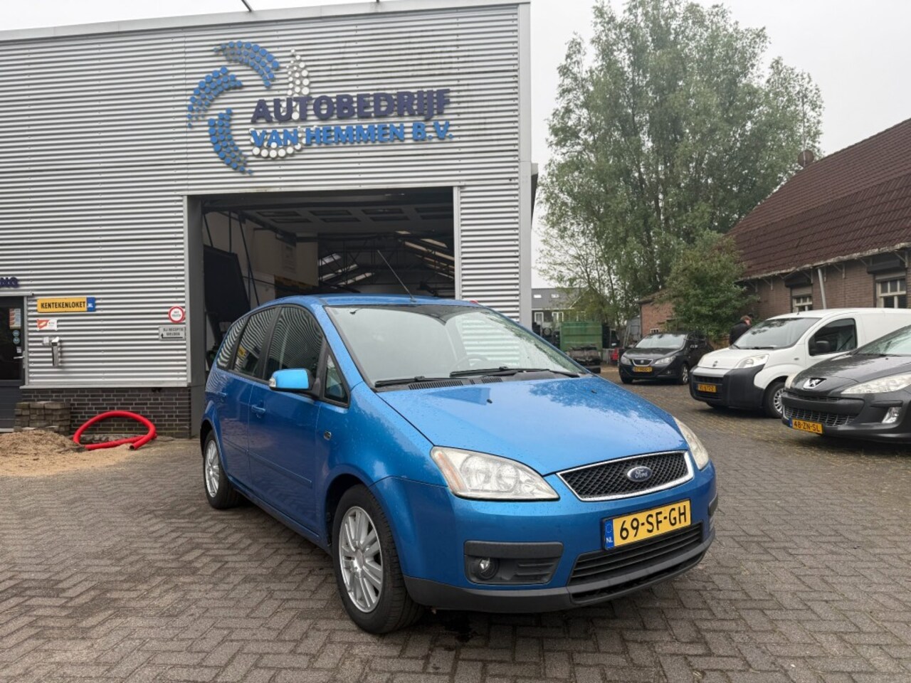 Ford Focus - 2.0-16V C-Max GHIA - AutoWereld.nl