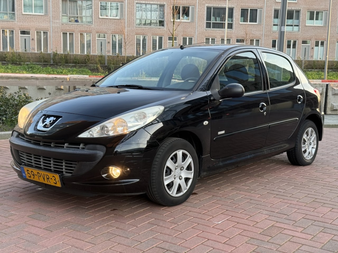 Peugeot 206 - 1.4 Benzine 75PK Millesim 200 Airco 5 Deurs - AutoWereld.nl