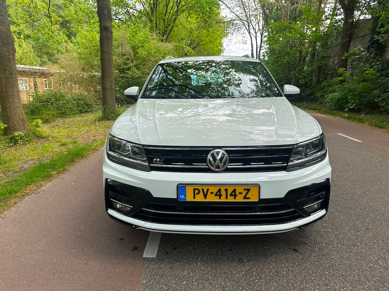 Volkswagen Tiguan - 1.4 TSI ACT Comfortline Business R LINE PANORAMADAK AUTOMAAT - AutoWereld.nl