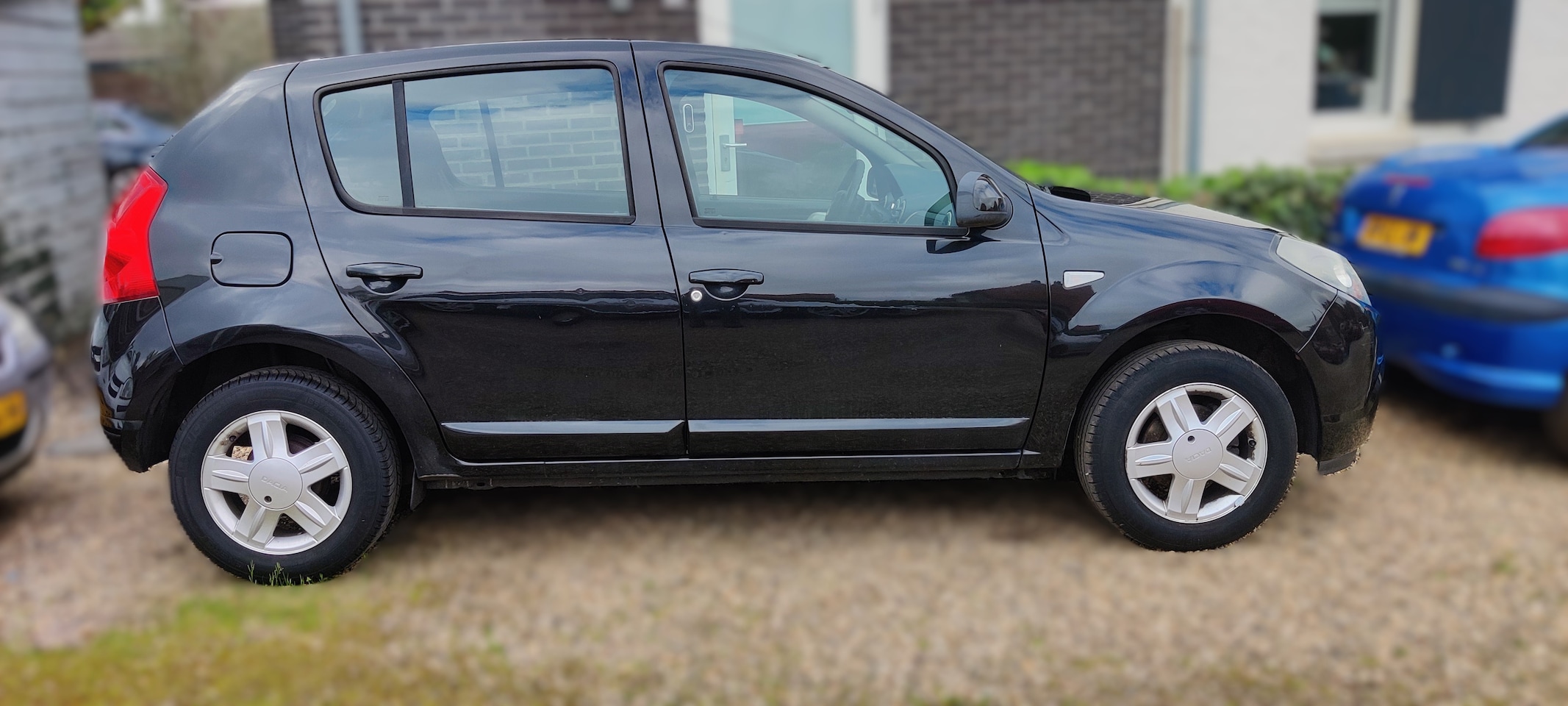 Dacia Sandero - 1.2 Blackline Trekhaak, nieuwe APK.