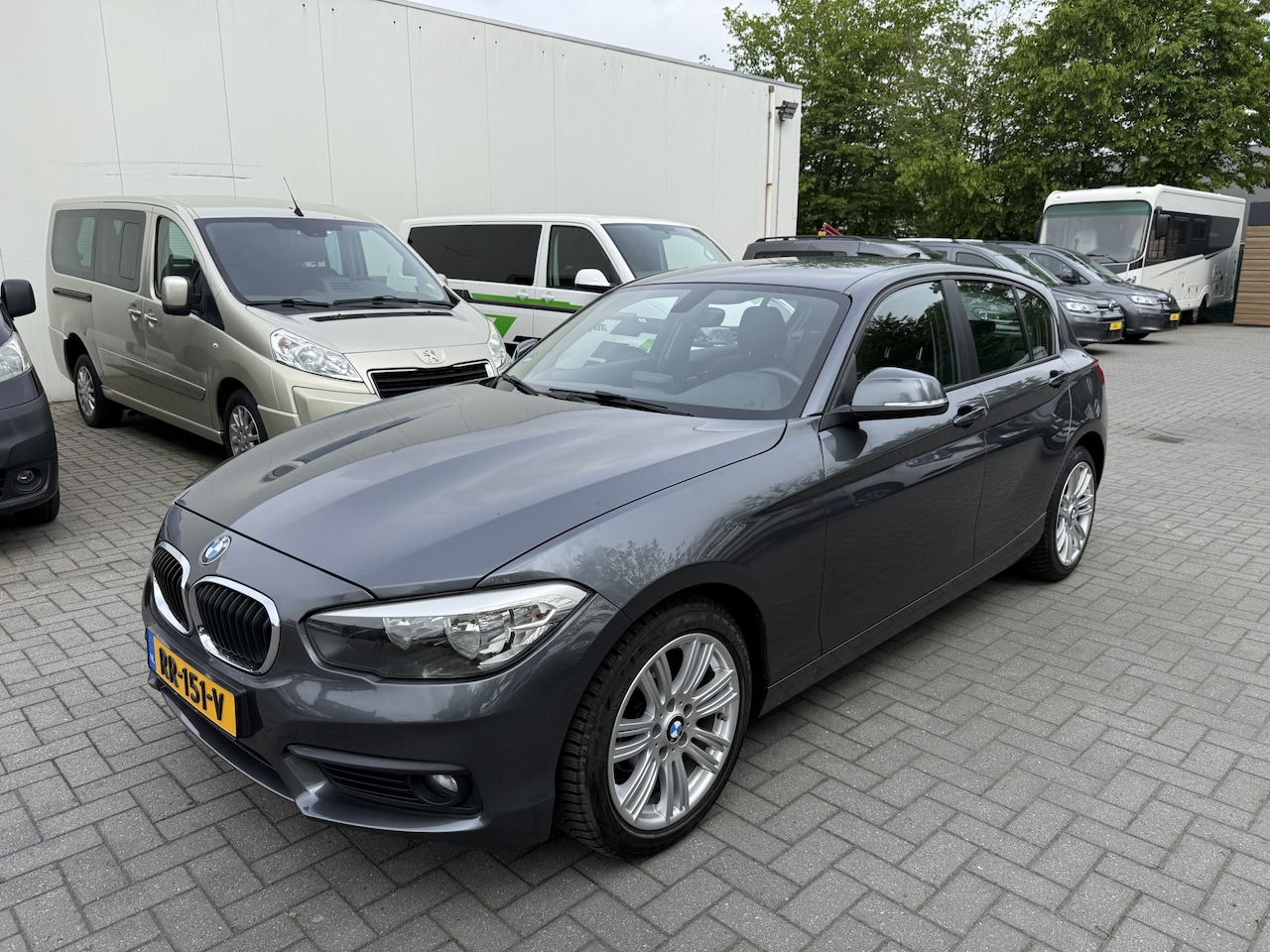 BMW 1-serie - 118i Corporate - Automaat - Clima - Navigatie - Origneel NL - Volledig Onderhouden - NAP - - AutoWereld.nl