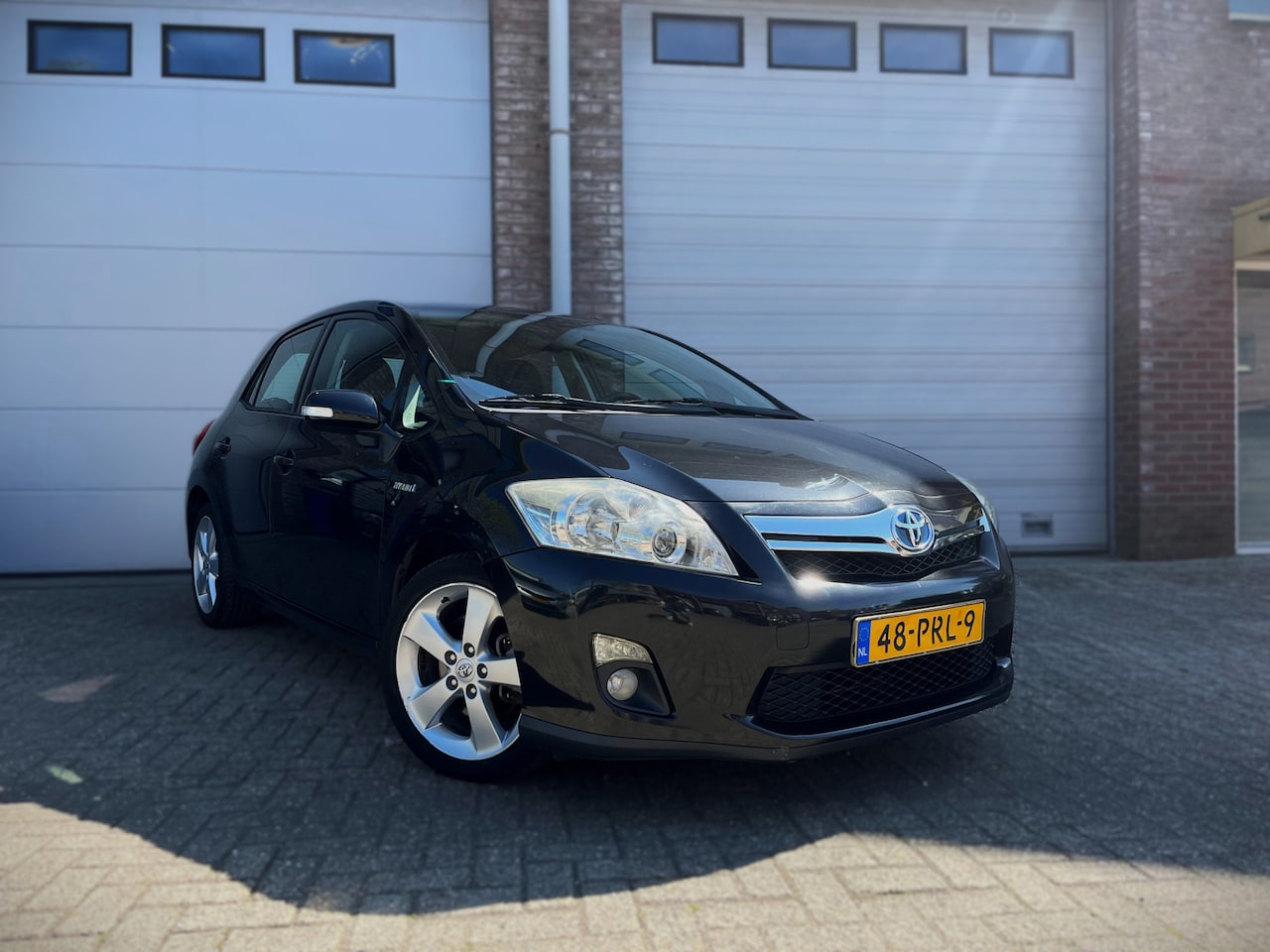 Toyota Auris - 1.8 Full Hybrid Executive N.a.p/Trekhaak/Garantie - AutoWereld.nl