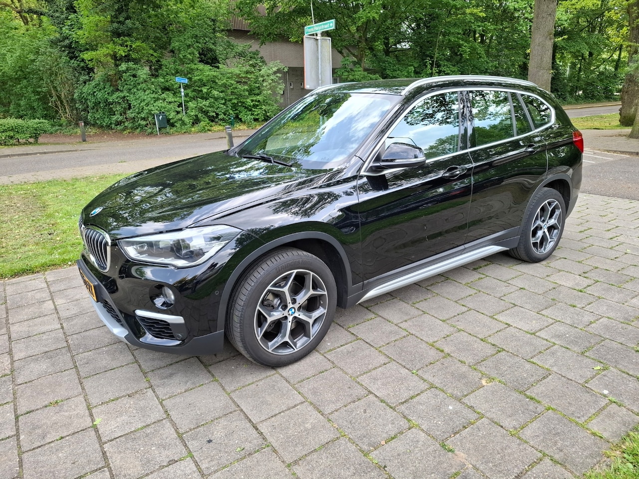 BMW X1 - 1.8i sDrive High Executive - AutoWereld.nl