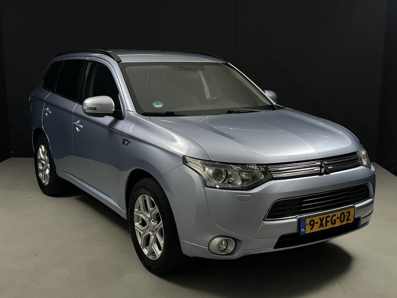 Mitsubishi Outlander - 2.0 PHEV Executive Edition *Hybride Automaat*Navi*AC*Heatseat* - AutoWereld.nl