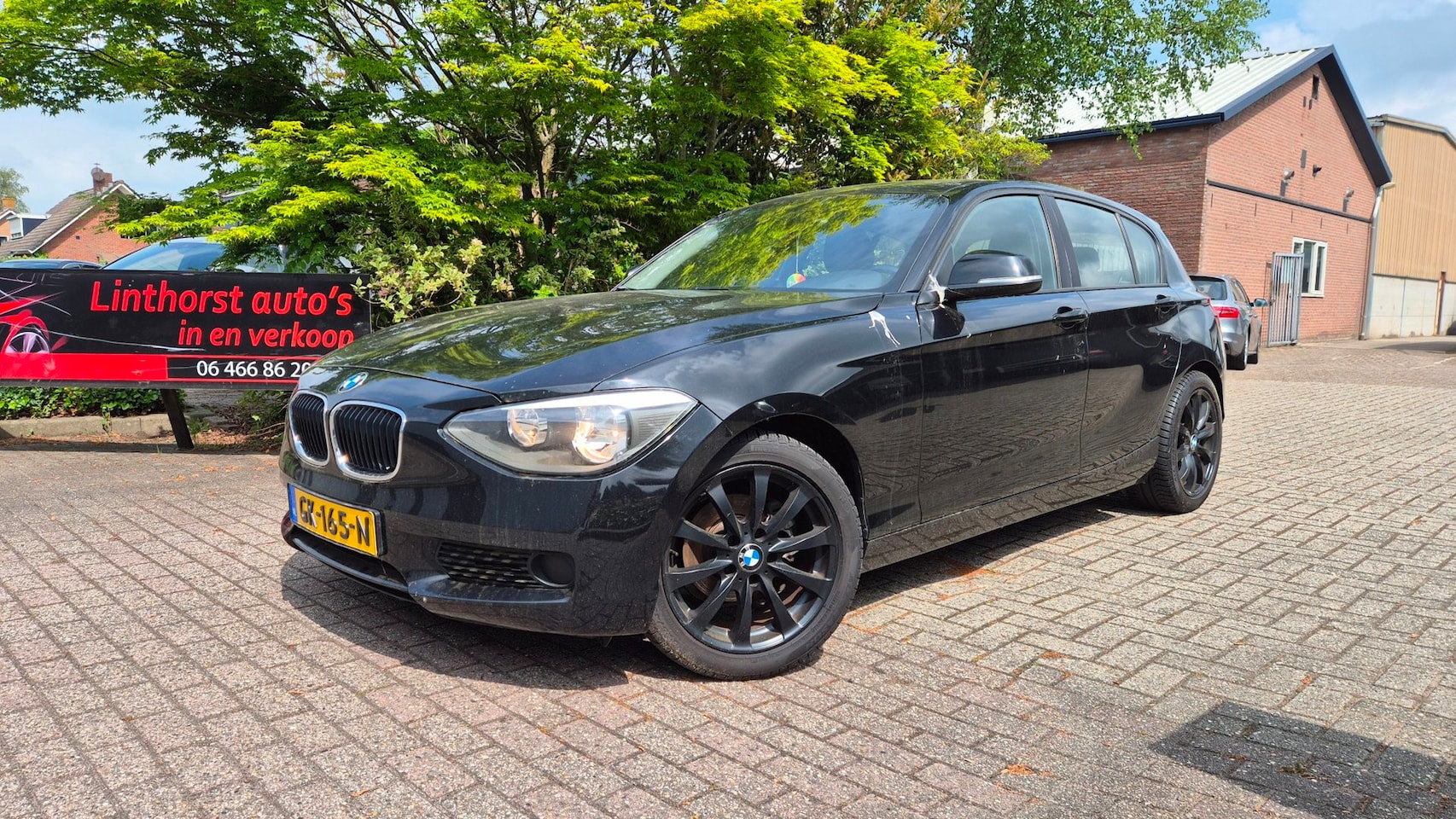 BMW 1-serie - 118d Business CLIMA-NAVI-BJ 2013 - AutoWereld.nl