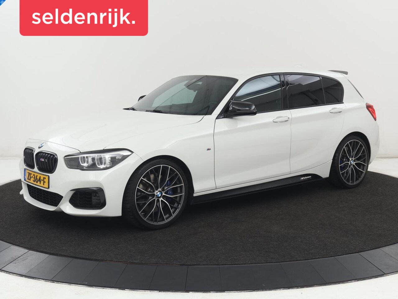 BMW 1-serie - M140i High Executive | Stoelverwarming | Carplay | Leder | Adaptief LED | Keyless | Naviga - AutoWereld.nl