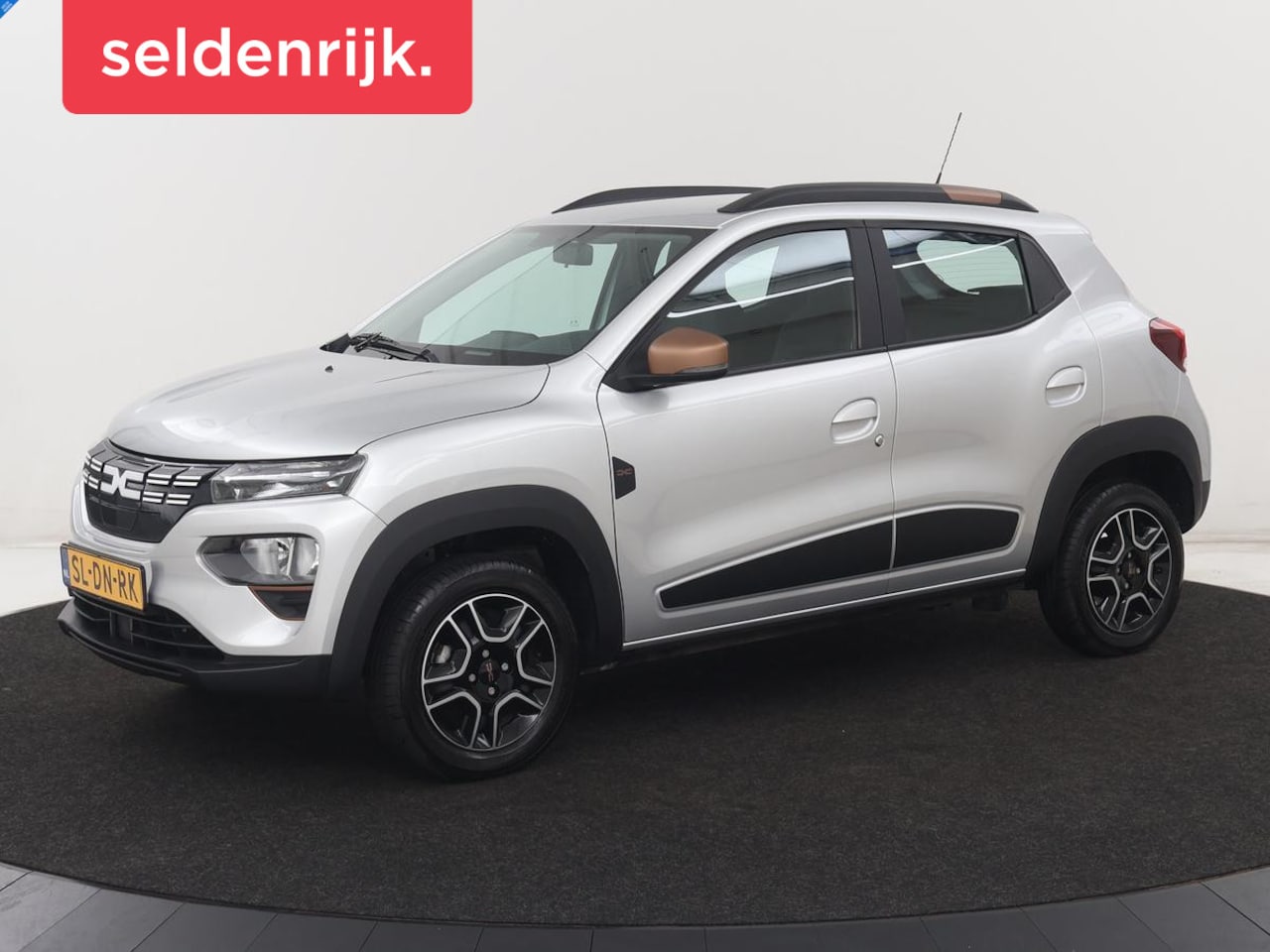 Dacia Spring - 65 Extreme 27 kWh | SOH 95,1% | Leder | Camera | Carplay | Airco | Speedlimiter | Bluetoot - AutoWereld.nl