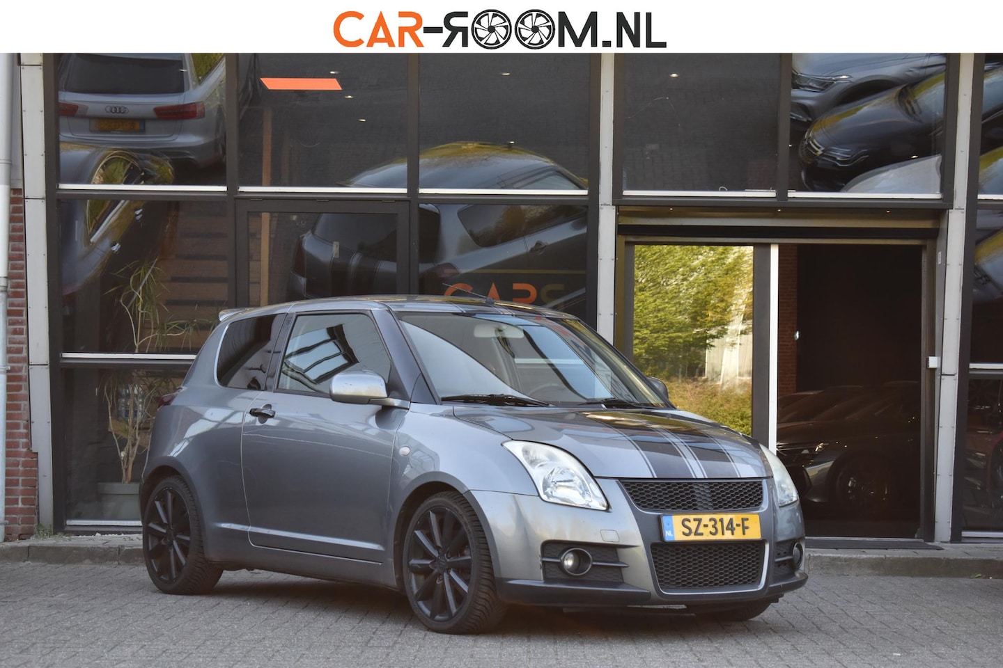 Suzuki Swift - 1.6 Sport Keyless Cruise Airco - AutoWereld.nl