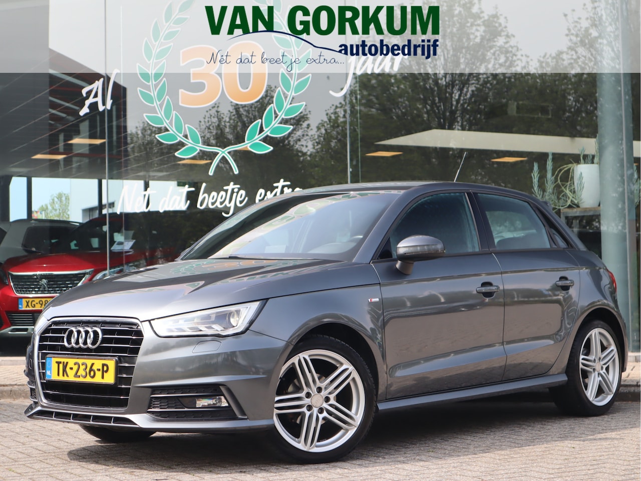 Audi A1 Sportback - 1.0 TFSI Advance Sport S-Line / Navi / Airco / Cruise / Lm17'' /  S-LINE - AutoWereld.nl