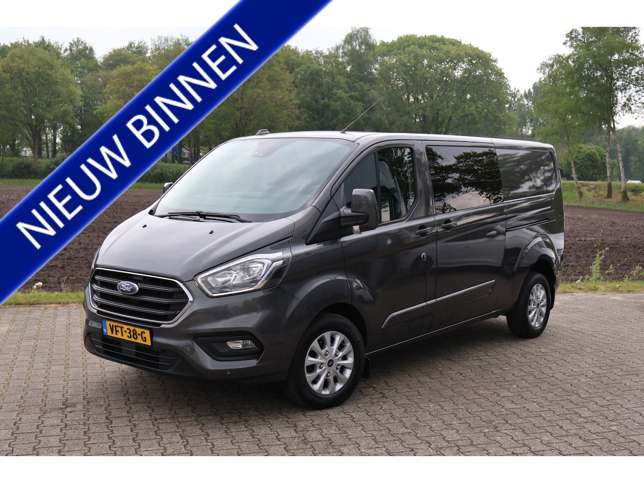 Ford Transit Custom - 2.0 TDCI L2H1 AUTOMAAT Limited DC, 2x schuifdeur - AutoWereld.nl