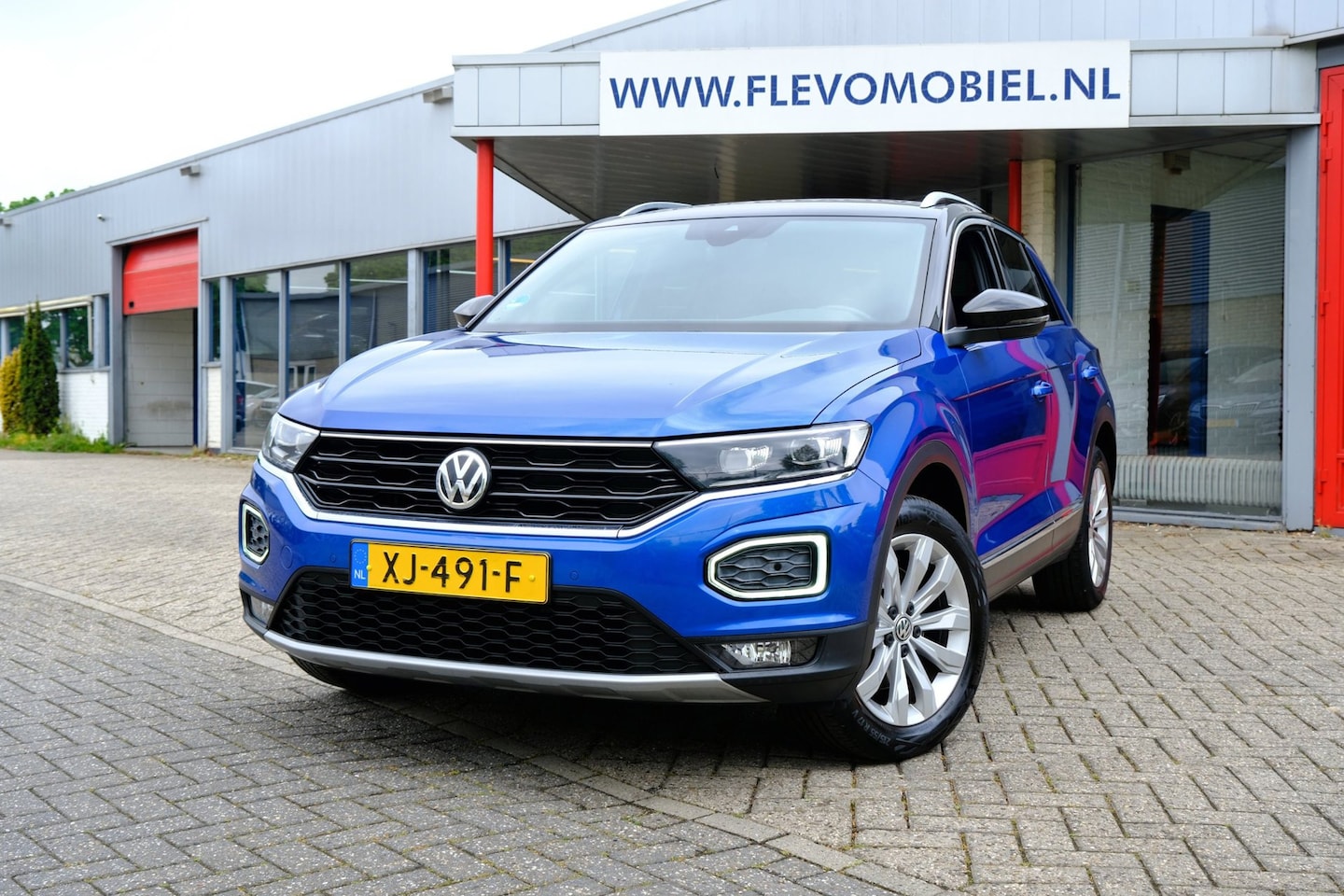 Volkswagen T-Roc - 1.0 TSI Sport Navi|Half Leder|CarPlay|Orig. NL! - AutoWereld.nl