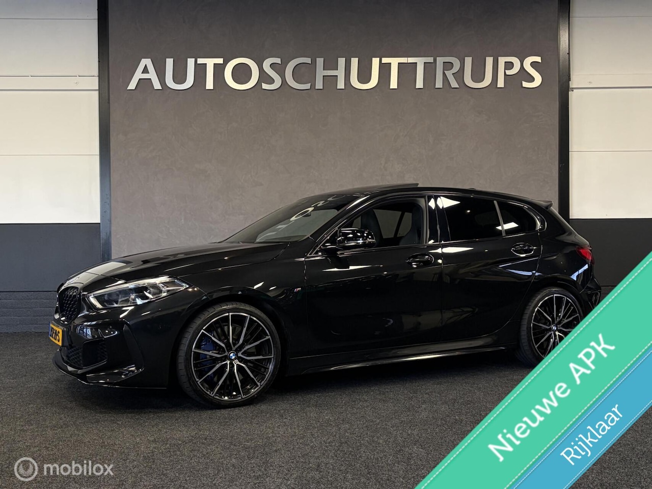BMW 1-serie - M135i xDrive High Executive Edition M SPORT / SCHUIFDAK / VOL LEDER / PANO / HARMAN & KARD - AutoWereld.nl