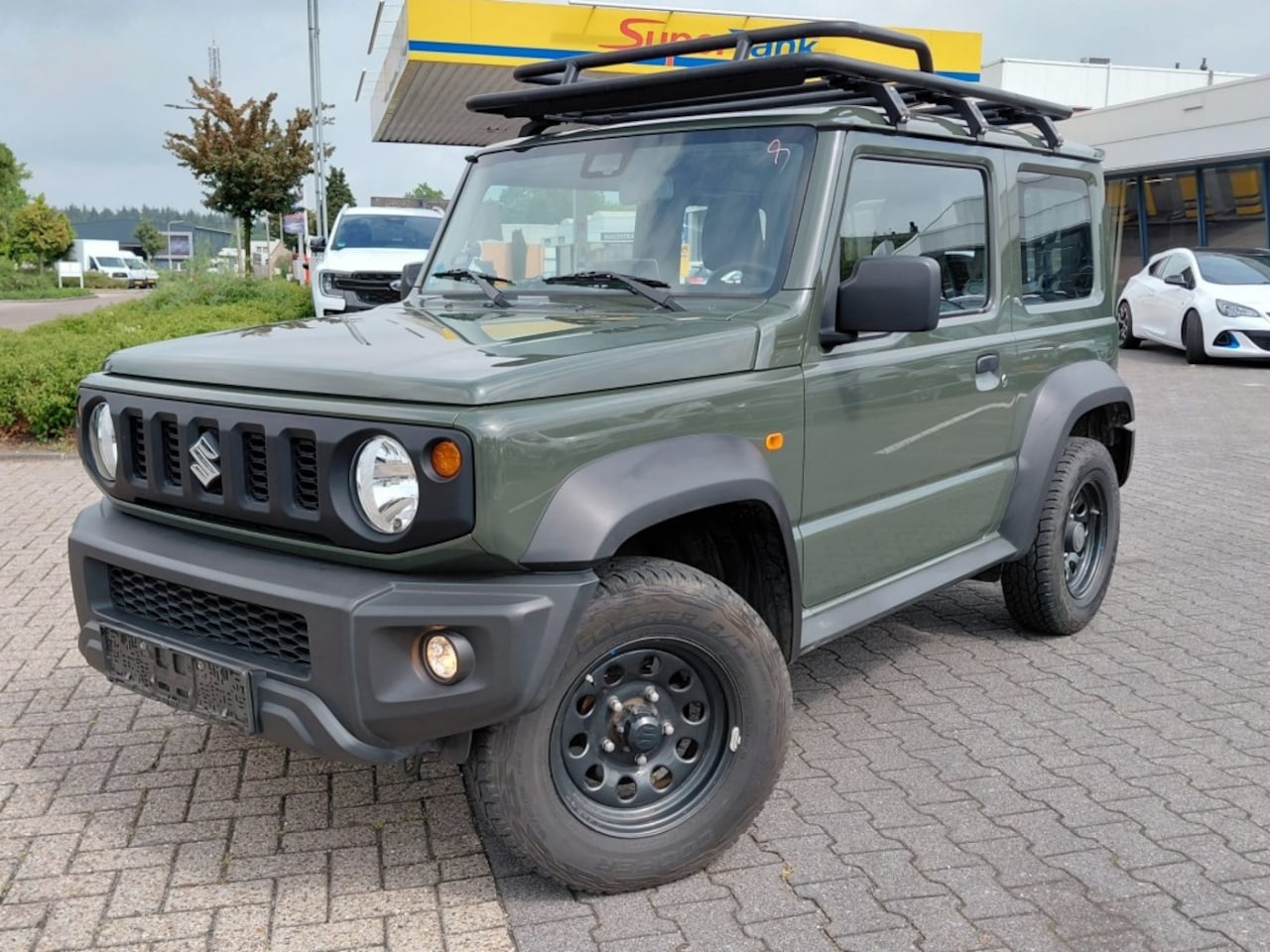 Suzuki Jimny - 1.5 ALLGRIP AUTOMAAT 4 PERSOONS CAMERA TREKHAAK - AutoWereld.nl