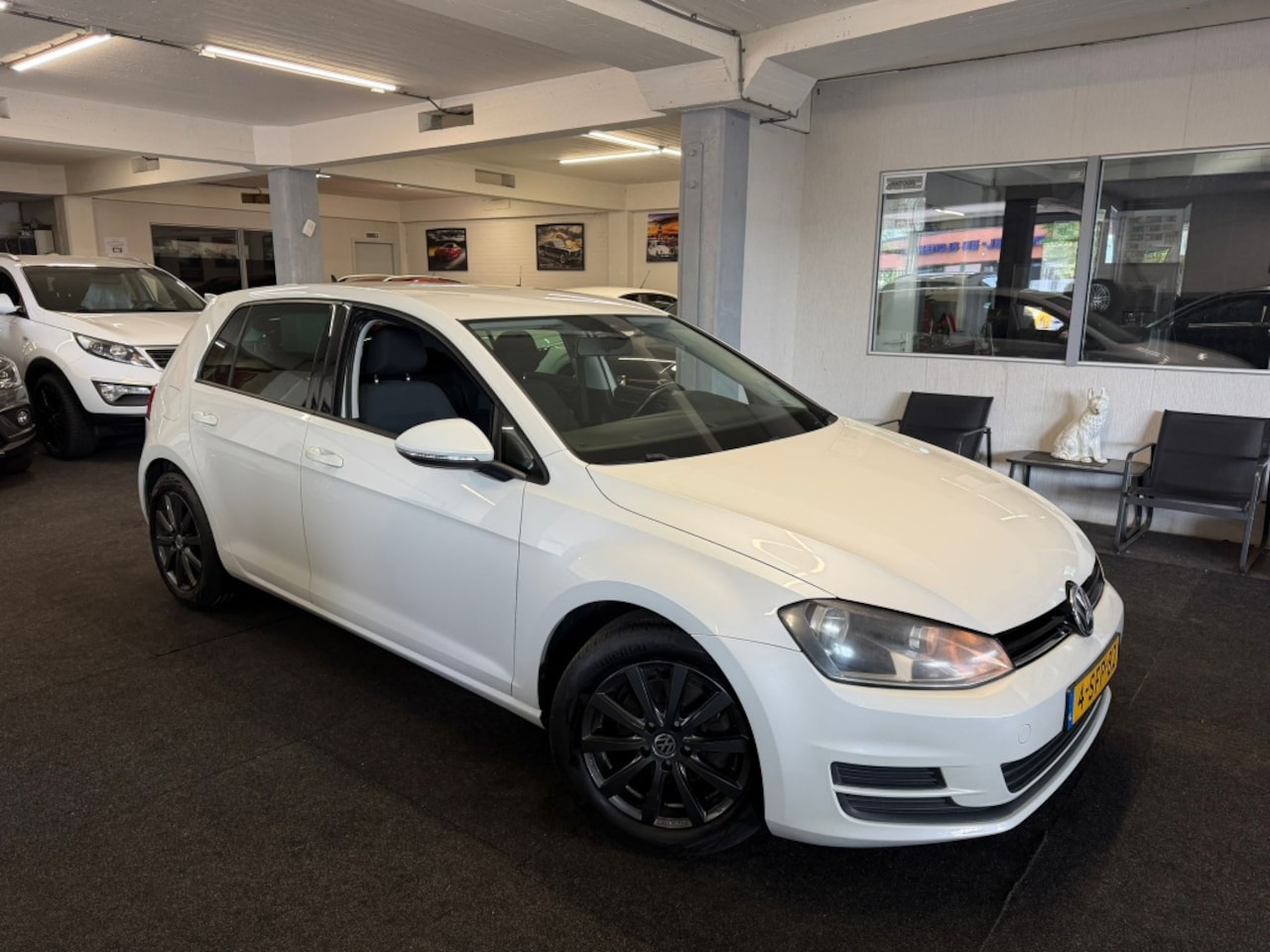 Volkswagen Golf - 1.2 TSI *NAP*NAVI*5deurs*Velgen - AutoWereld.nl