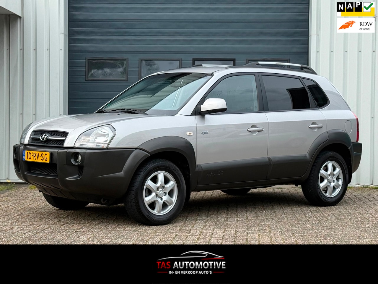 Hyundai Tucson - 2.7i V6 4WD Style 2e EIG / AUTOMAAT / LEER - AutoWereld.nl