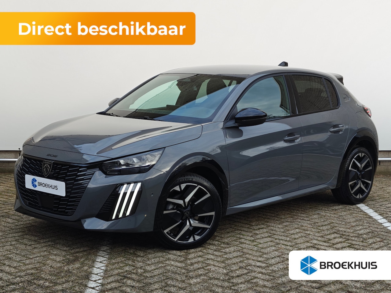 Peugeot 208 - GT | Armsteunen op de voorportieren bekleed met kunstleder met groen sierstiksel (GT-Line) - AutoWereld.nl