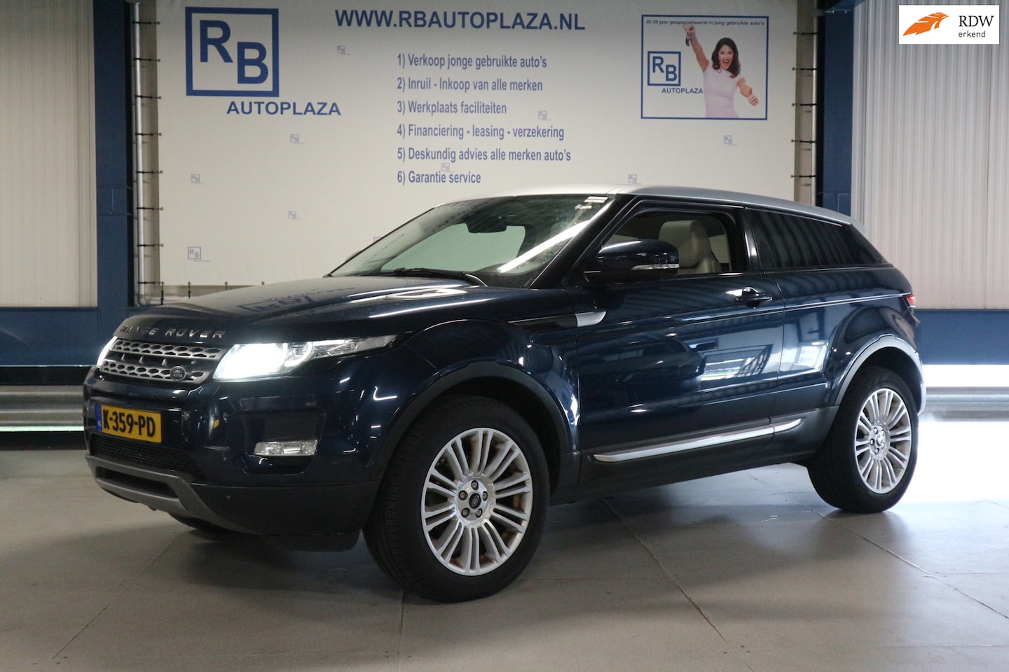 Land Rover Range Rover Evoque Coupé - 2.0 Si 4WD Prestige / VOL IN DE OPTIES / 12 MND GARANTIE ! ! ! - AutoWereld.nl