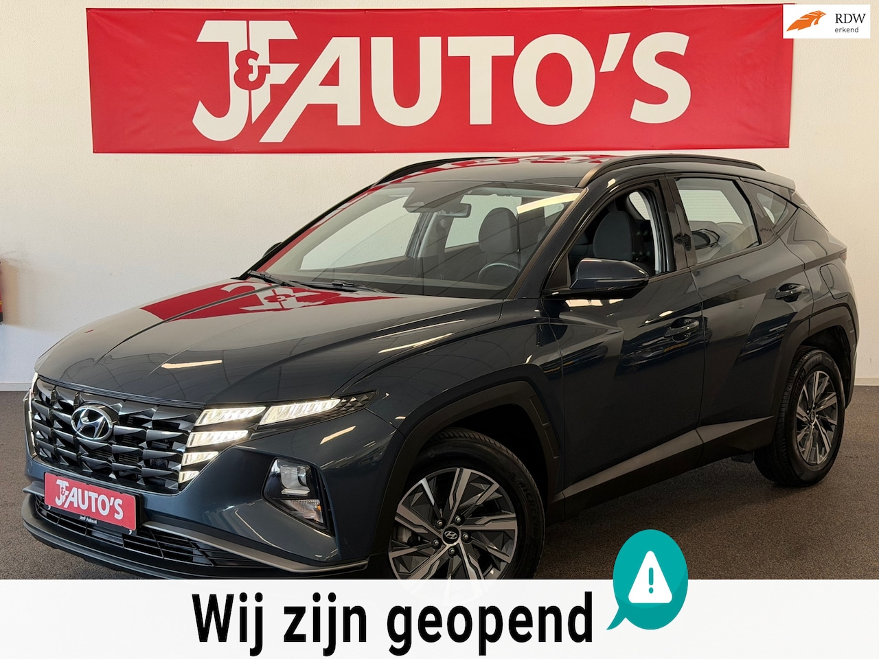 Hyundai Tucson - 1.6 T-GDI MHEV NAVI|CAMERA|CAR-PLAY|ECC AIRCO - AutoWereld.nl