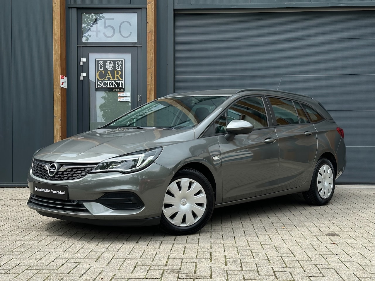Opel Astra Sports Tourer - 1.2 Business Edition Carplay, DAB, Cruise, Dealer OH - AutoWereld.nl
