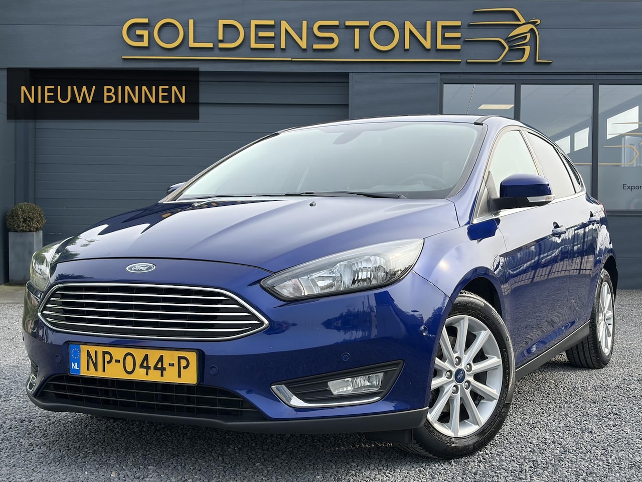 Ford Focus - 1.0 Titanium 2e Eigenaar,Dealer Onderhouden,Navi,Pdc V+A,125pk,Clima,Cruise,6 Bak,Lm velge - AutoWereld.nl