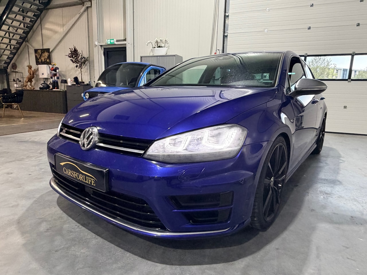 Volkswagen Golf - 2.0 TSI R 4Motion DSG LAPIZ BLUE 300PK. - AutoWereld.nl