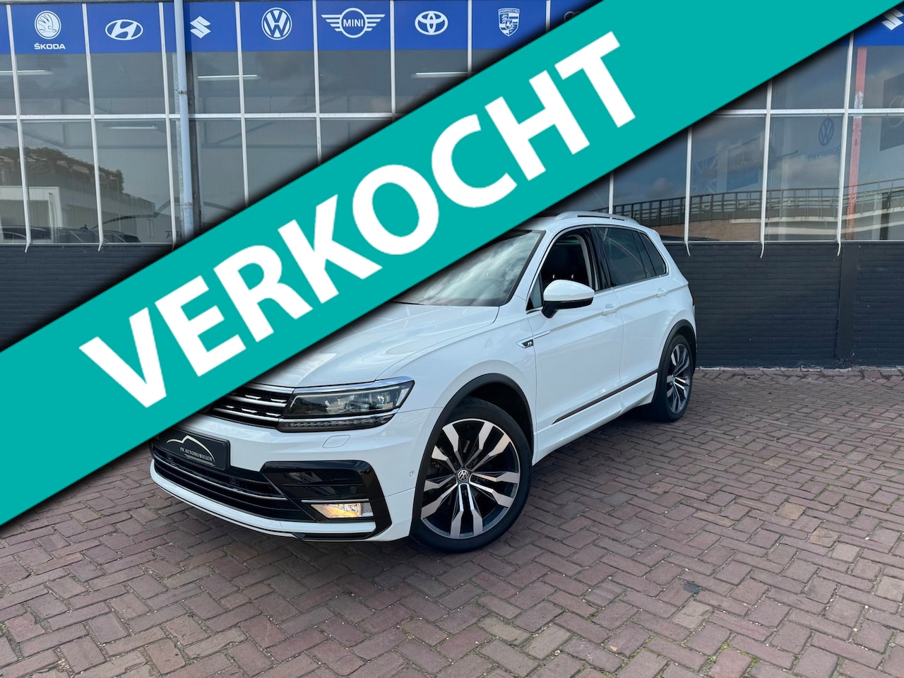 Volkswagen Tiguan - 1.4 TSI Comfortline R-Line **PANODAK + THAAK** - AutoWereld.nl
