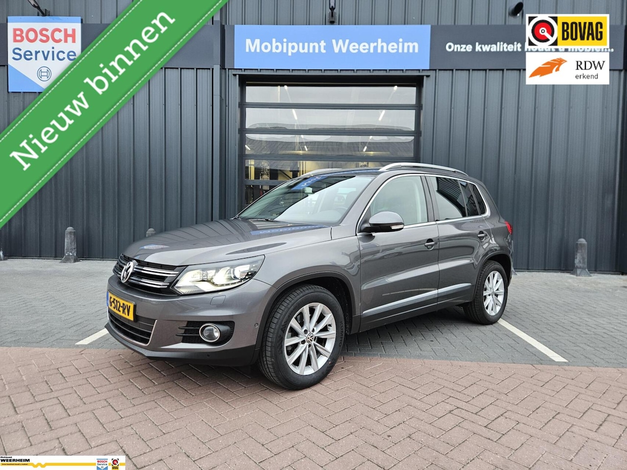 Volkswagen Tiguan - 1.4 TSI Sport&Style AUTOMAAT - AutoWereld.nl