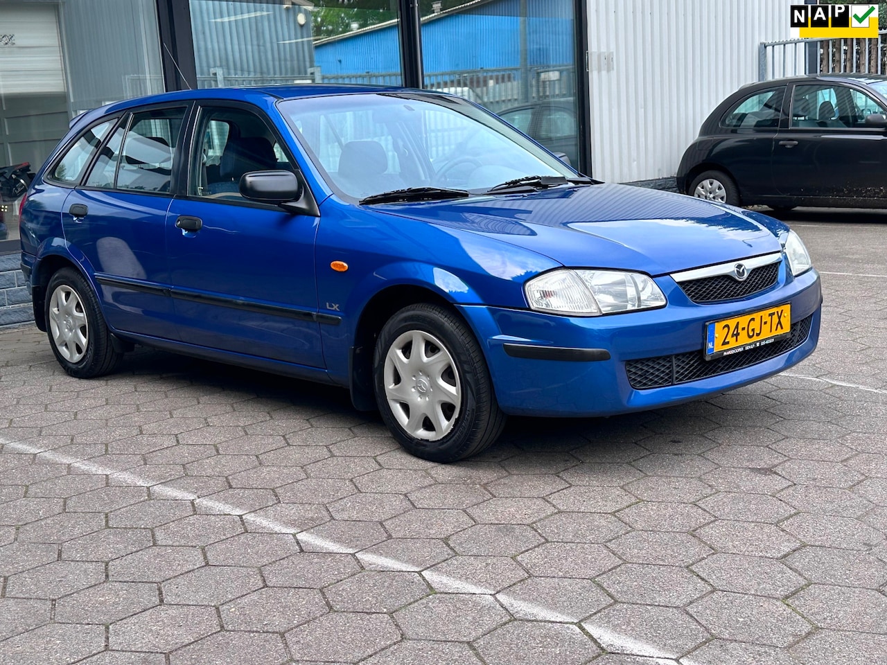Mazda 323 Fastbreak - 1.5i LS 1.5i LS - AutoWereld.nl