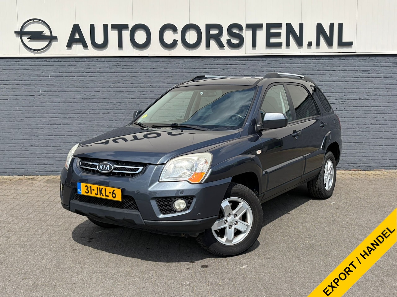 Kia Sportage - 2.7-V6 Automaat X-ecutive 4WD Trekhaak Ecc Cruise Control Pdc AWD Lmv 16" Privacy Glas Blu - AutoWereld.nl