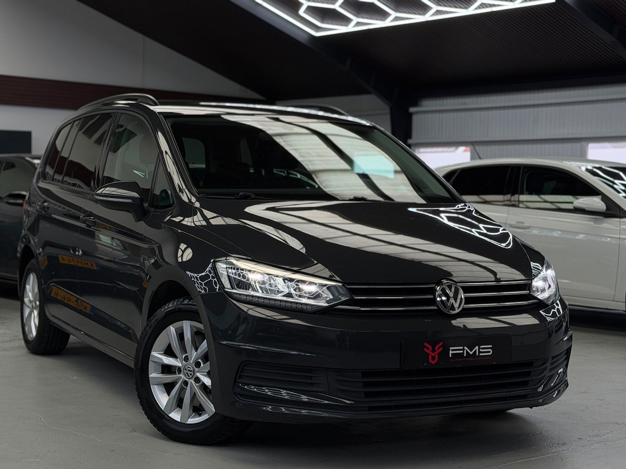 Volkswagen Touran - 1.4 TSI Highline 7p. 1.4 TSI Highline 7p CarPlay - AutoWereld.nl