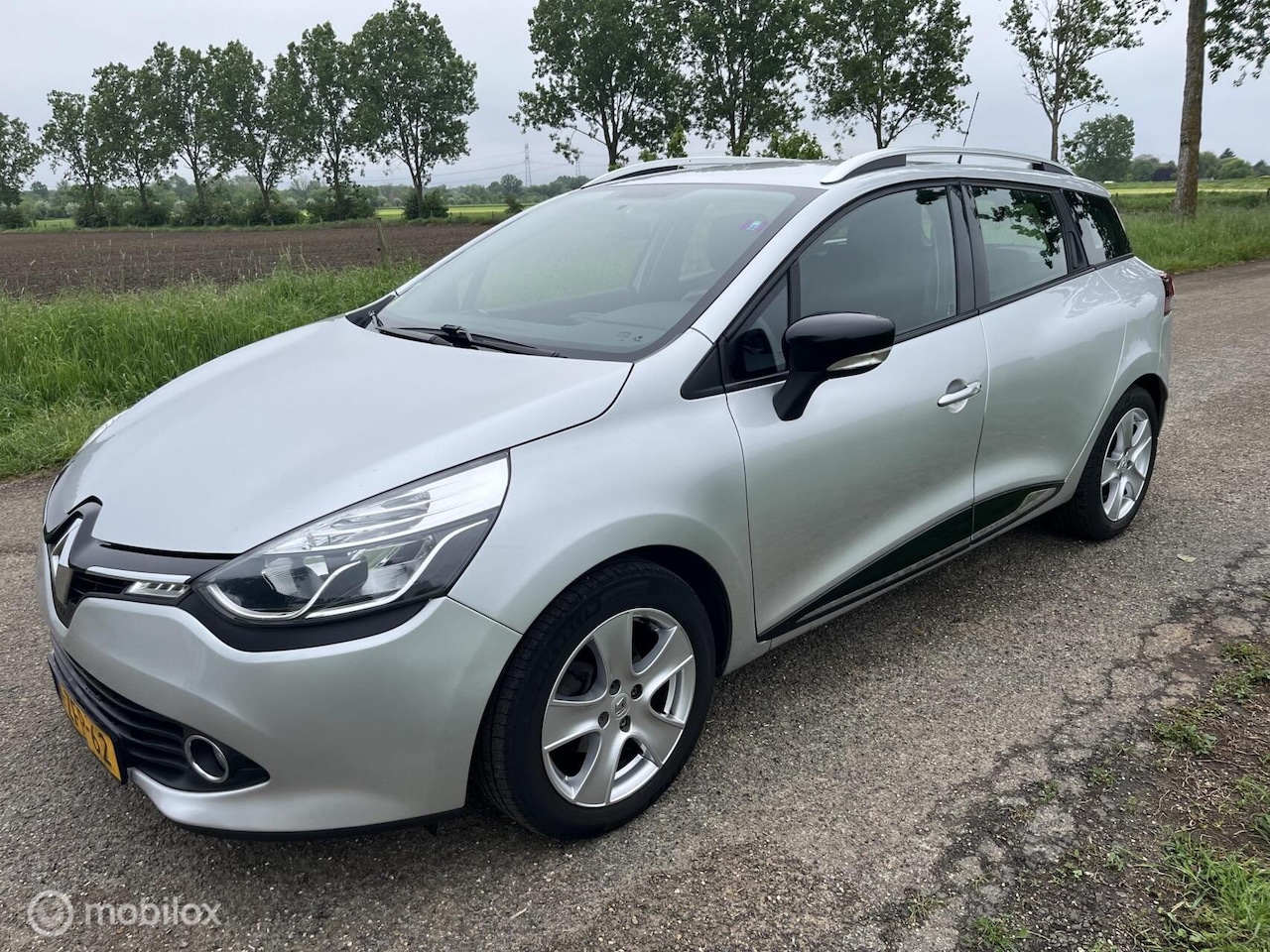 Renault Clio Estate - 1.5 dCi ECO Expression/Clima/Navi/Cruise - AutoWereld.nl