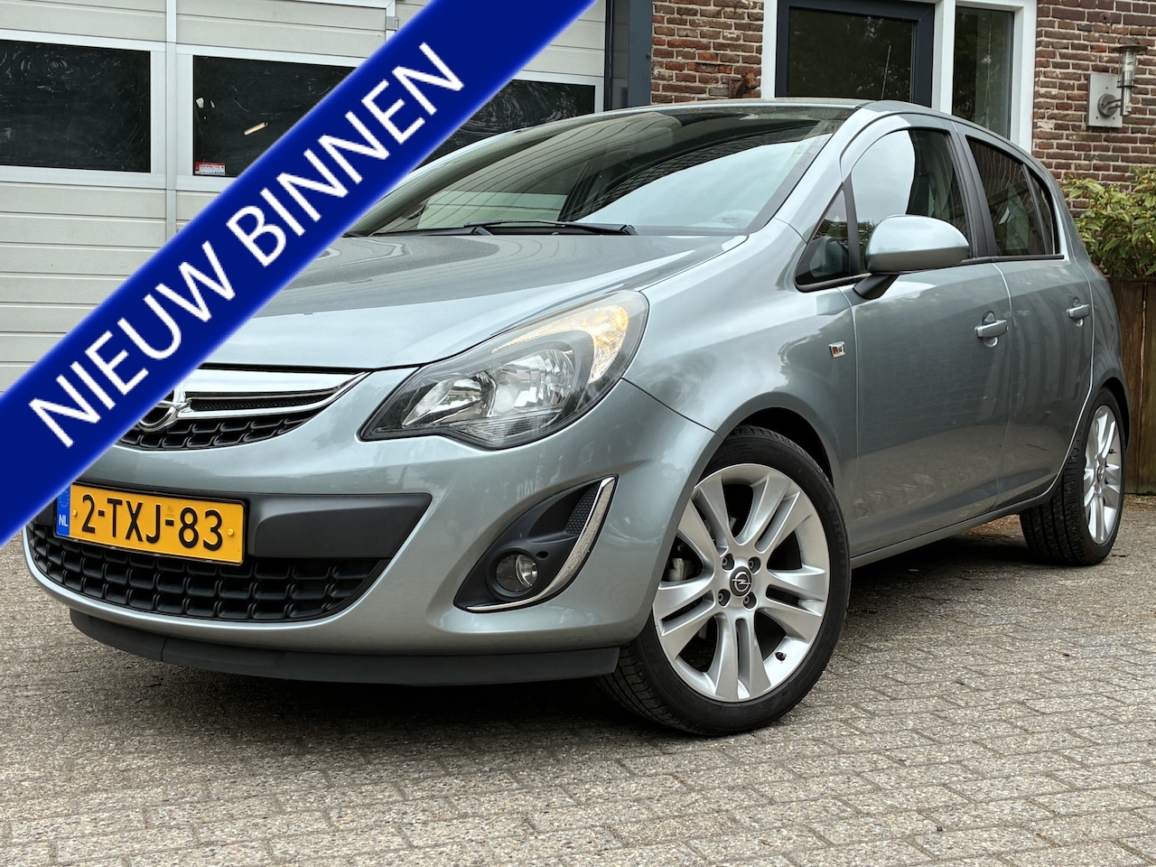 Opel Corsa - 1.4-16V BlitZ '14 Airco Cruise Navi 100 Pk 82 Dkm! - AutoWereld.nl