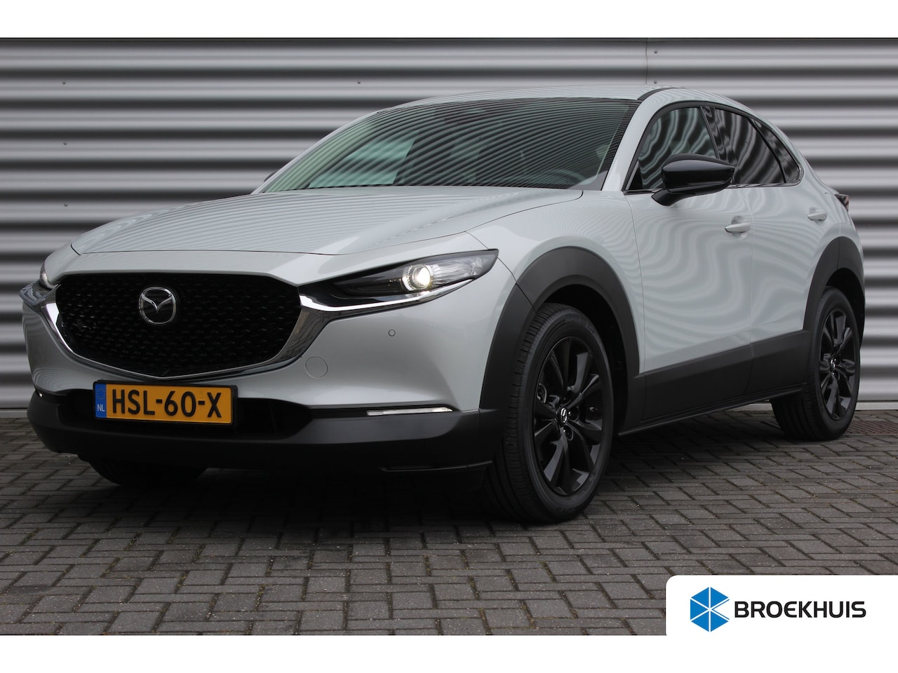 Mazda CX-30 - 2.5 e-SKYACTIV-G M HYBRID 140PK HOMURA AUTOMAAT / NAVI / CLIMA / FULL-LED / PDC / 18" LMV - AutoWereld.nl