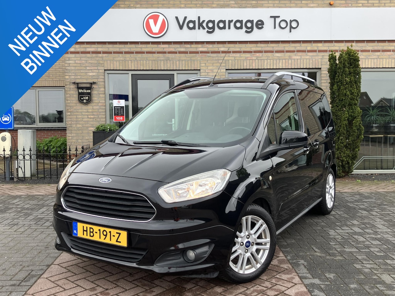 Ford Tourneo Courier - 1.0 Titanium | Navi | Garantie | 1e eigenaar - AutoWereld.nl