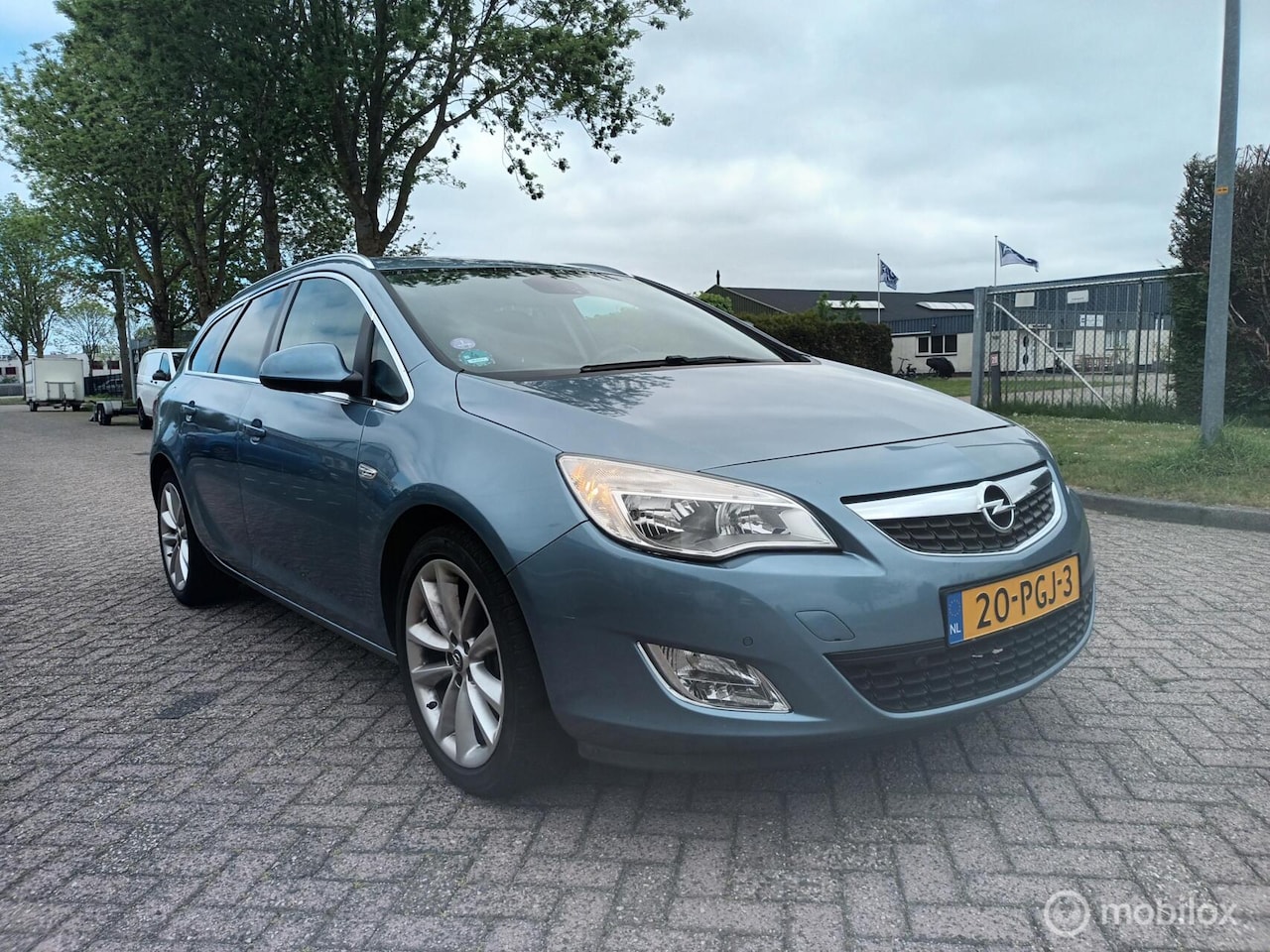 Opel Astra Sports Tourer - 1.4 Turbo Cosmo Stuur Stoel Verwarm - AutoWereld.nl