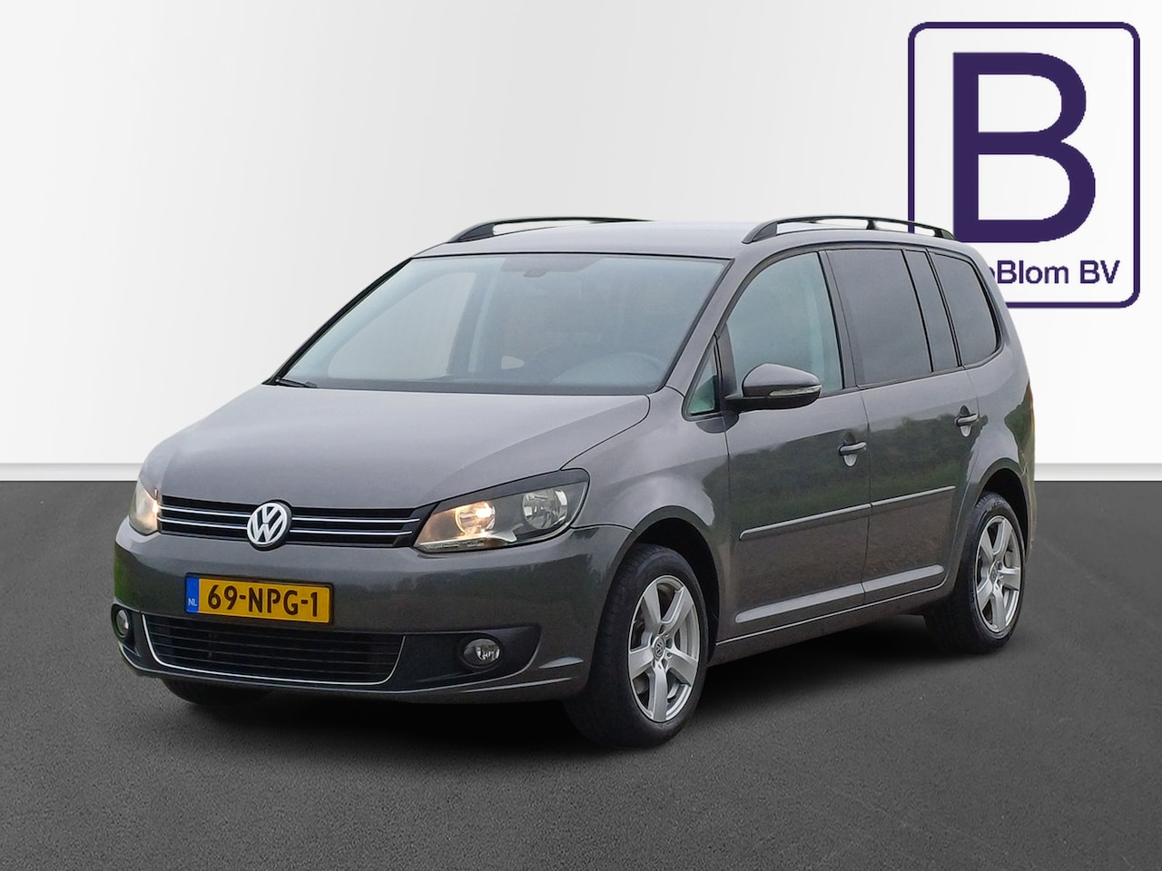 Volkswagen Touran - 1.2 TSI Comfortline BlueMotion 7-Pers. /Leder/Trekh./Navi/Cruise/Clima/ - AutoWereld.nl