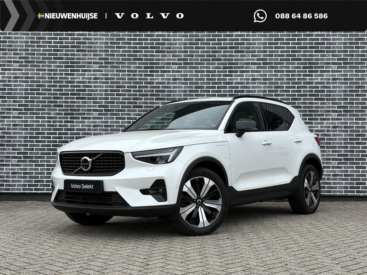 Volvo XC40 - 1.5 T5 Plug-in Hybrid Ultimate Dark | Tailored Wool | 360 Graden Camera | All-season bande - AutoWereld.nl