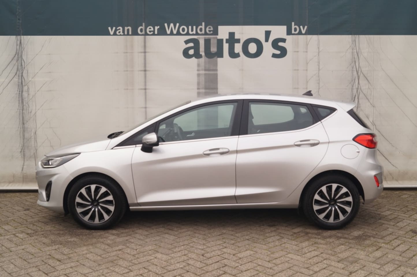 Ford Fiesta - 1.0 EcoBoost 124pk Hybrid Titanium -NAVI-PDC- - AutoWereld.nl