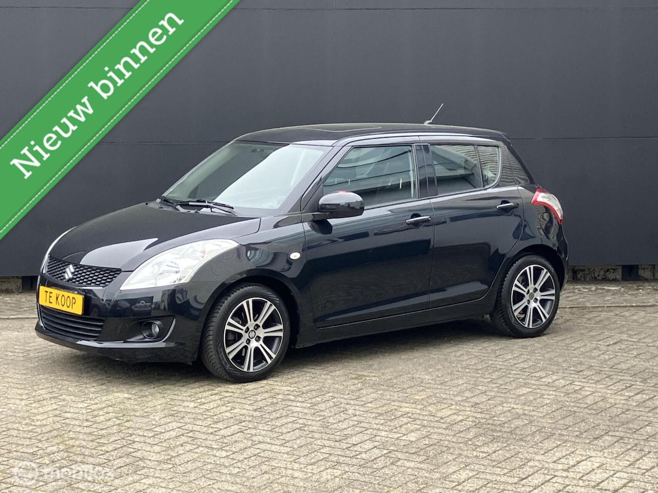 Suzuki Swift - 1.2i 5-drs Executive ClimateControl Key-less - AutoWereld.nl