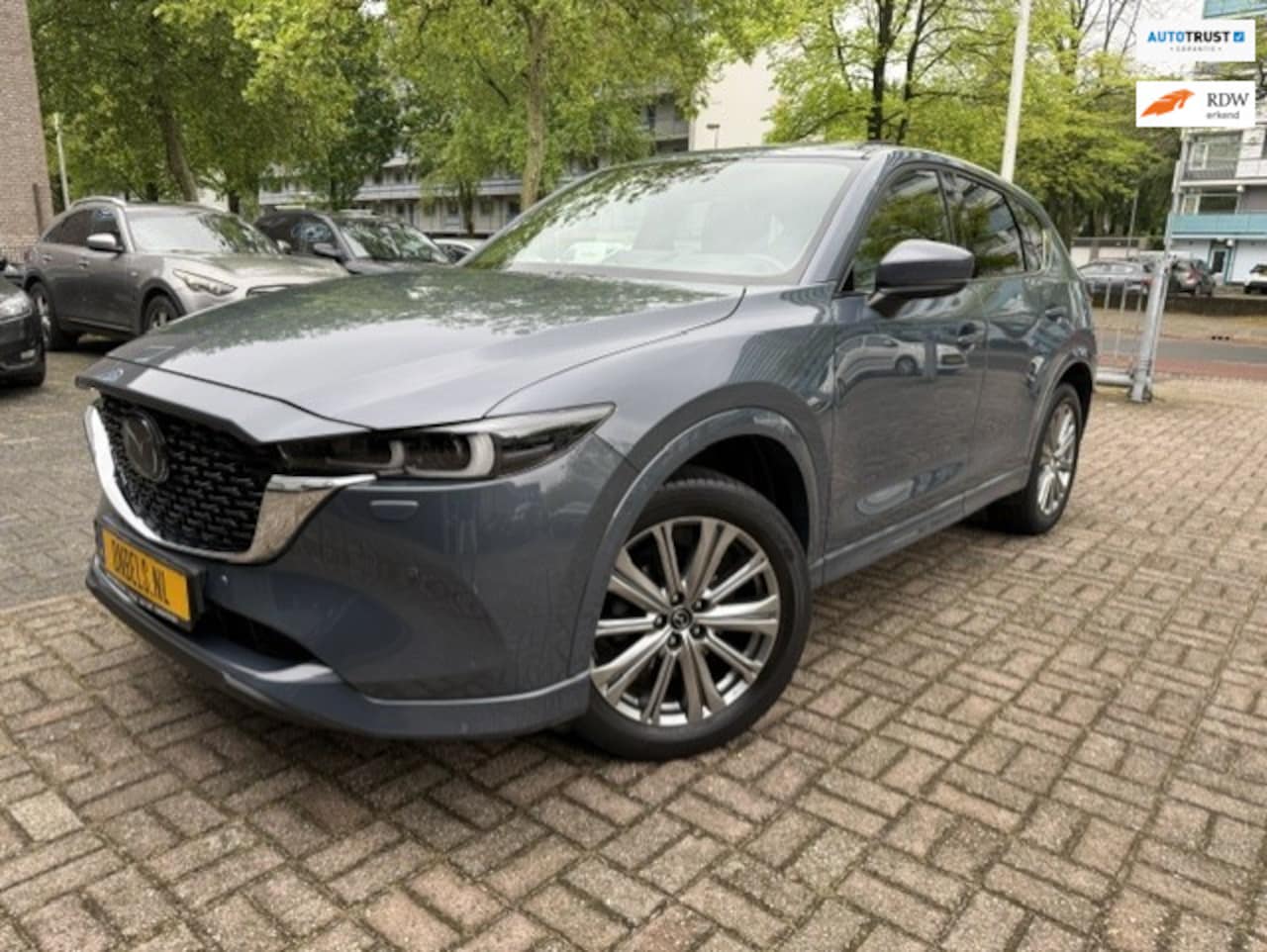 Mazda CX-5 - 2.0 e-SkyActiv-G M Takumi Leer/Opendak/Trekh - AutoWereld.nl